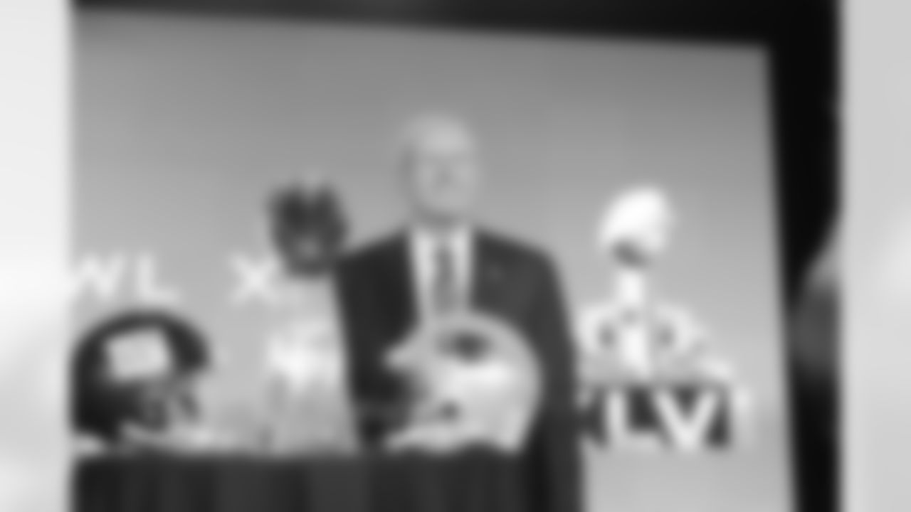 Tom Coughlin poses with the Vince Lombardi Trophy