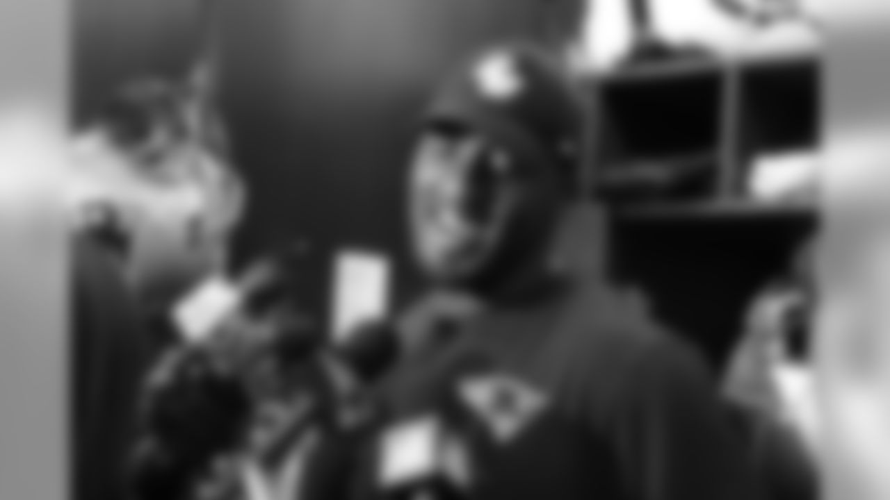 Zach Moore talks with the media