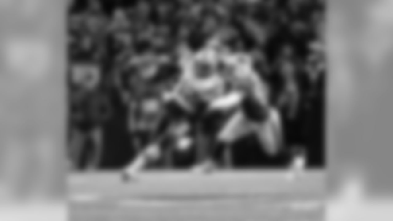 Tom Brady and Jerry Hughes