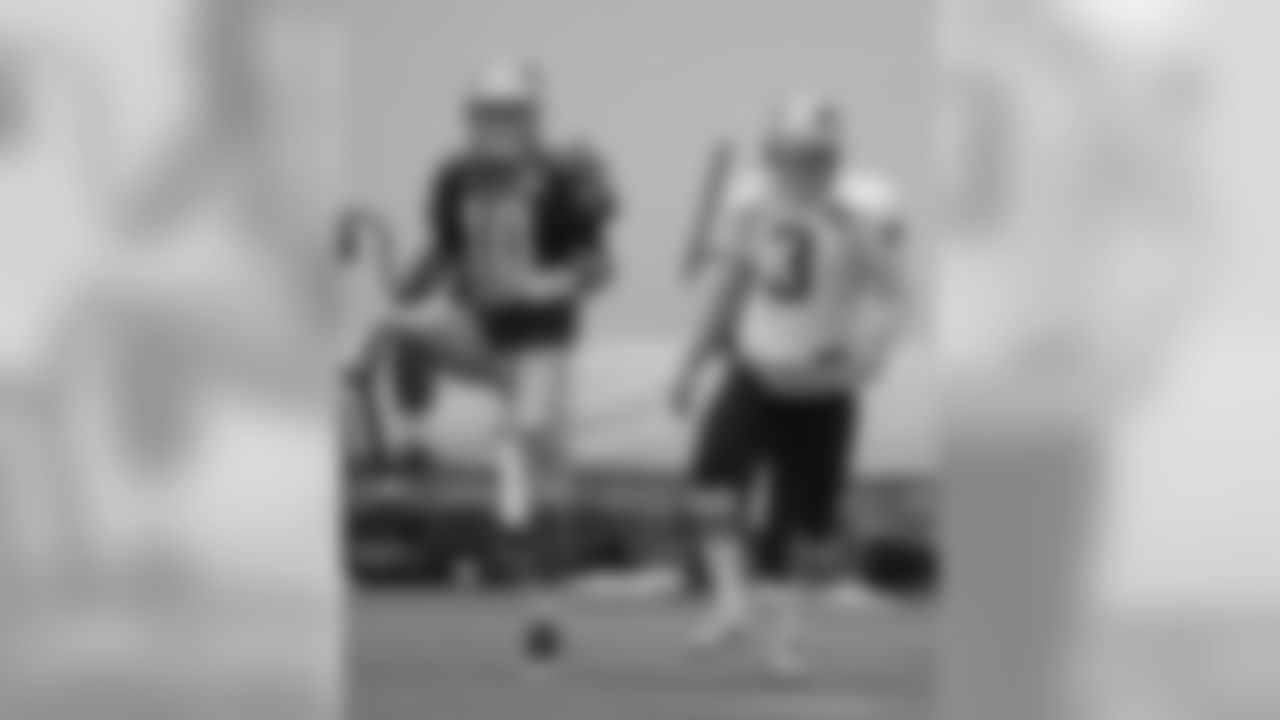 Jimmy Garoppolo and Stephen Gostkowski stretch before practice