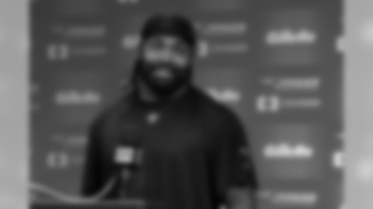 Jerod Mayo talks with the media during his press conference
