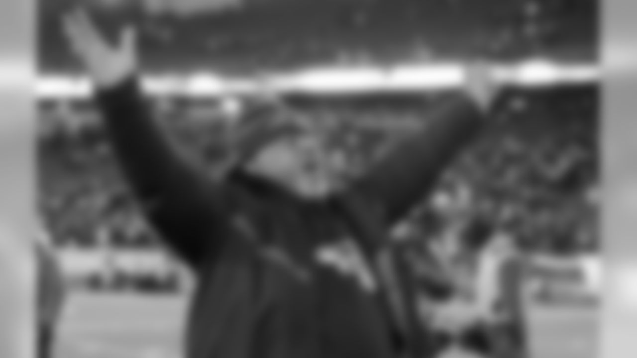 New England Patriots runningbacks coach Ivan Fears celebrates as he leaves the field after defeating the Houston Texans 34-16 in an NFL divisional playoff football game, Saturday, Jan. 14, 2017, in Foxborough, Mass. (AP Photo/Elise Amendola)