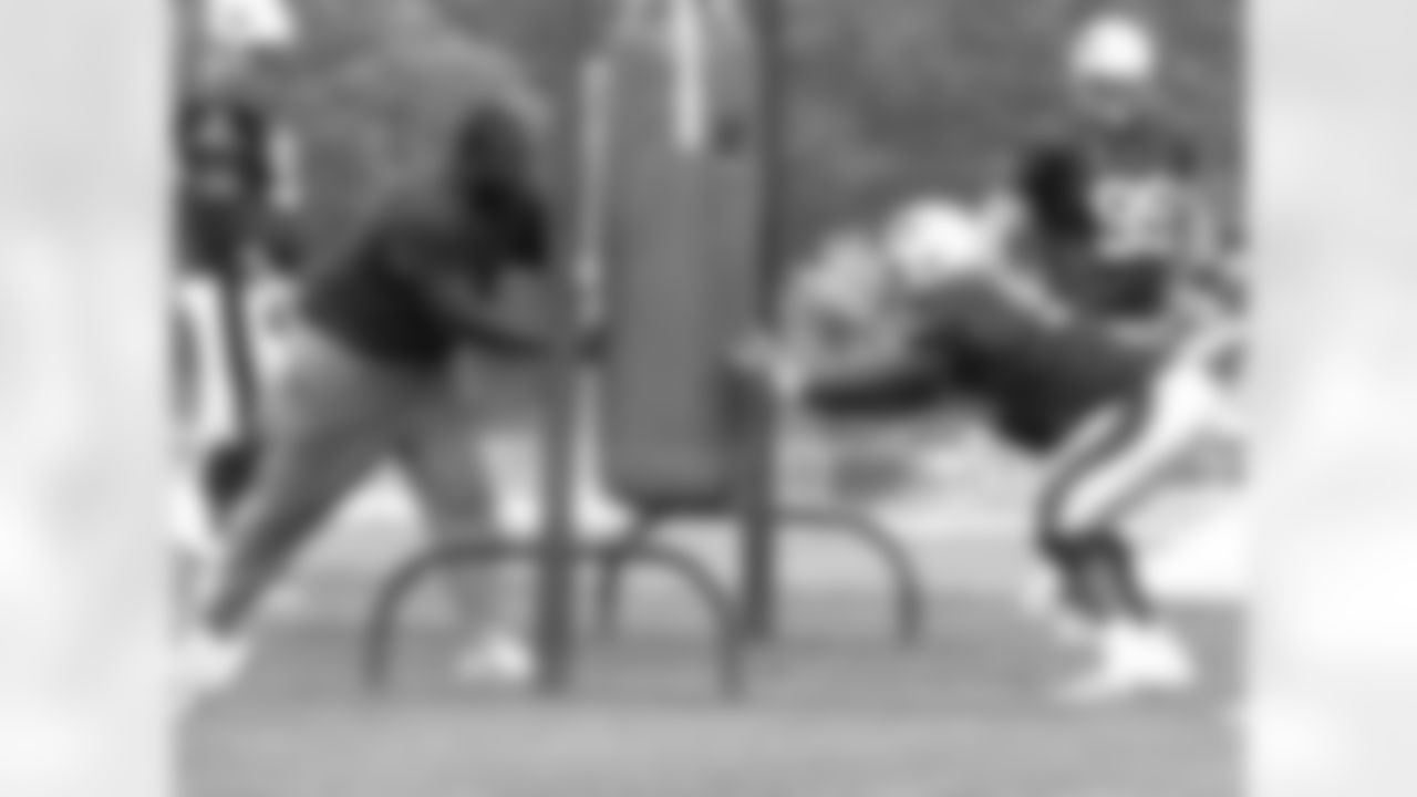 Coach Pepper Johnson instructs defensive linemen during practice on Day 9 of Training Camp. 8/7/2006 Photo by Elizabeth Propper