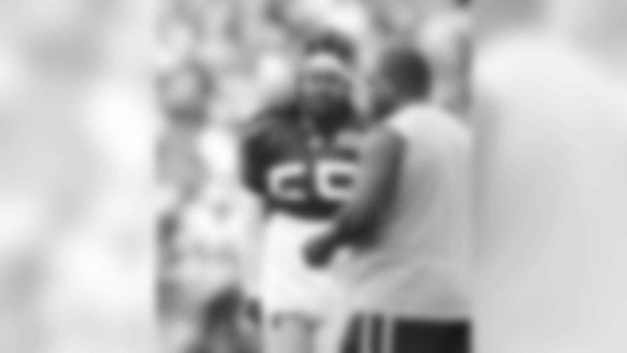 Brandon Spikes talks with Pepper Johnson