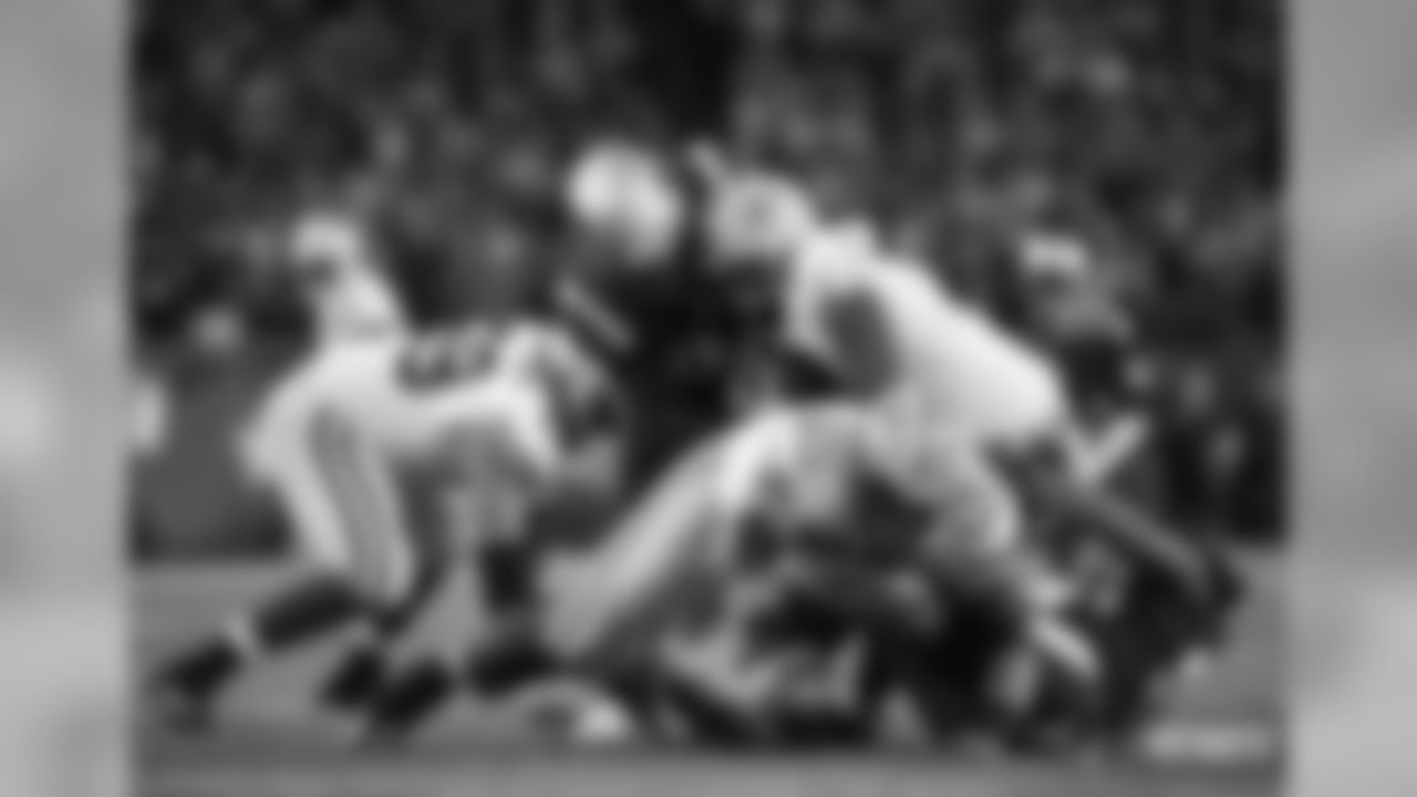 Adrian Clayborn and Aaron Rodgers