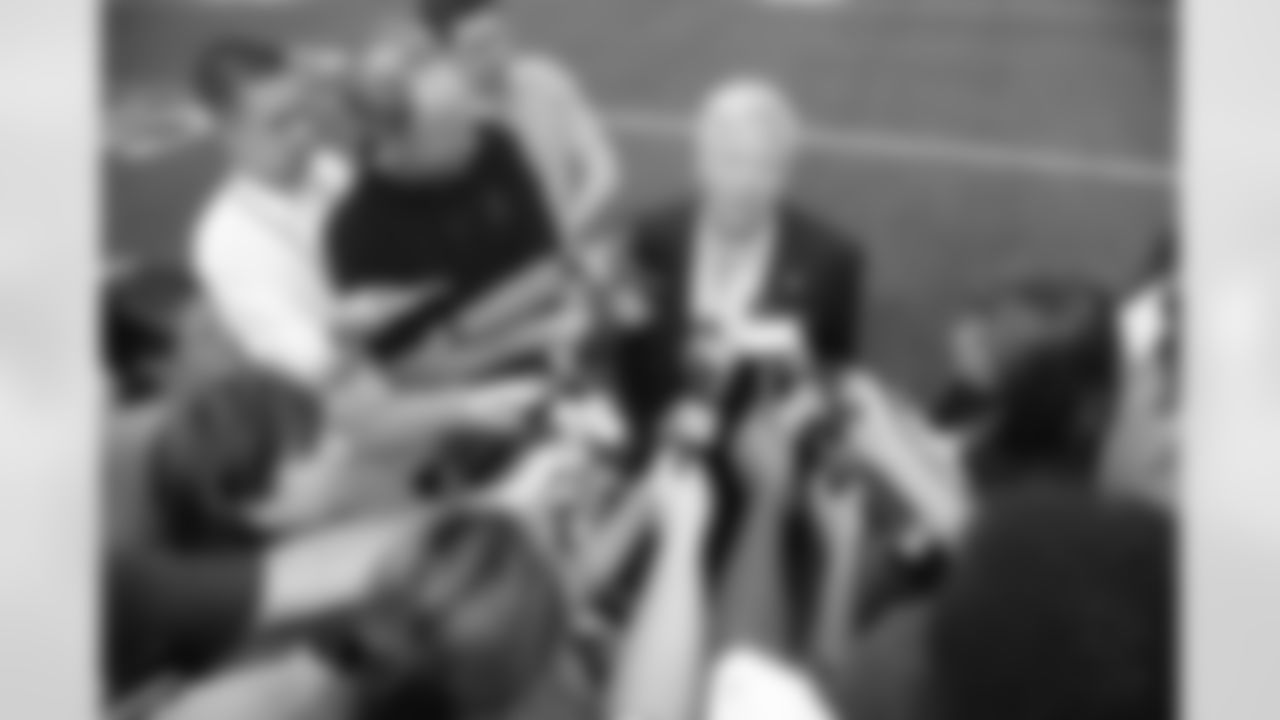 Patriots Chairman and CEO Robert Kraft talks with the media