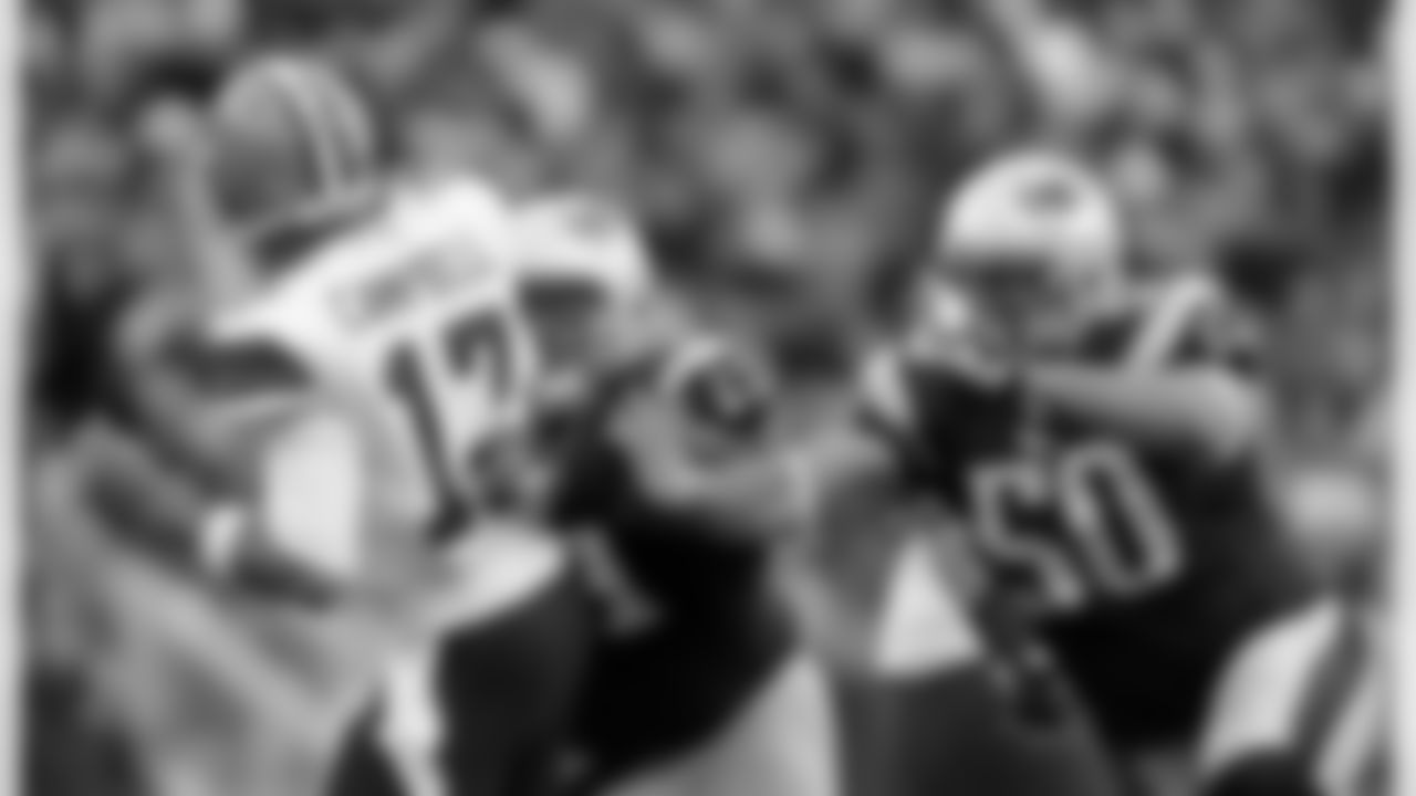 Rob Ninkovich pressures Jason Campbell