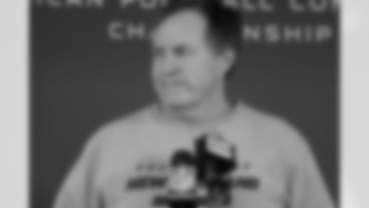 Bill Belichick talks with the media