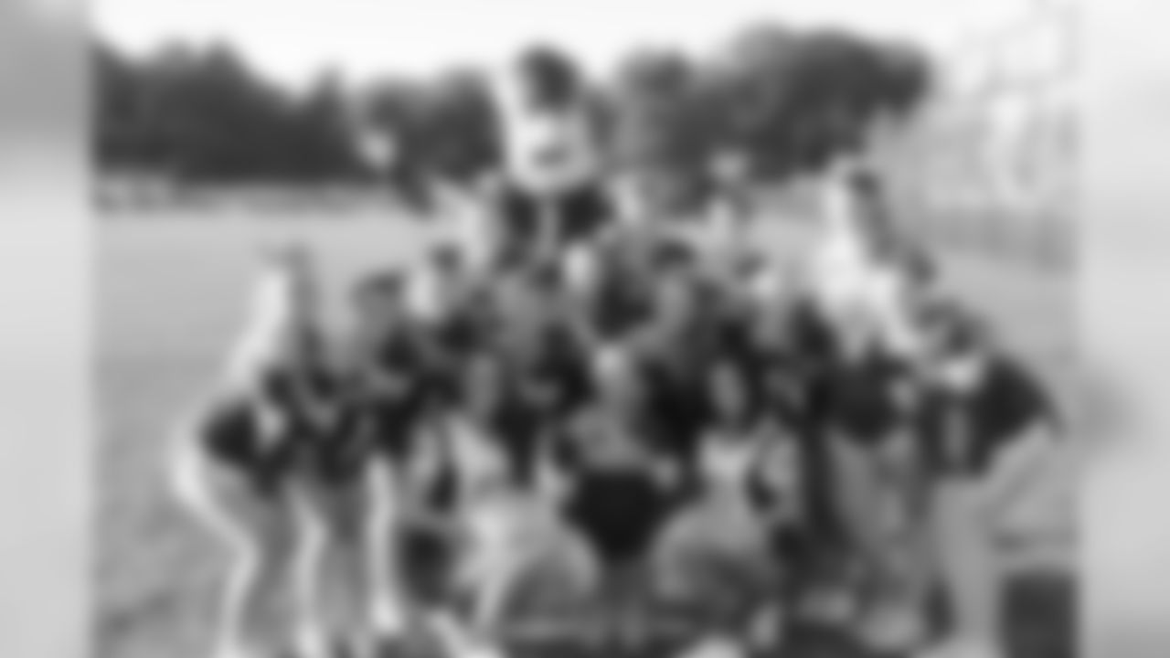 Melissa, Brittany, and Pat Patriot posed with the Attleboro High School Cheerleading team on Setptember 20th