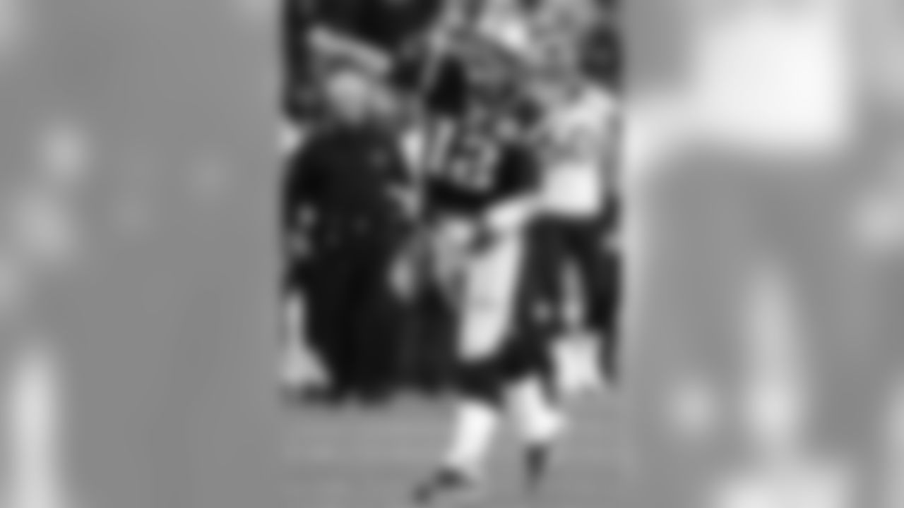 New England Patriots quarterback Tom Brady (12) reacts after running for yardage against the Houston Texans during the third quarter of an NFL football game in Foxborough, Mass., Monday, Dec. 10, 2012. (AP Photo/Stephan Savoia)