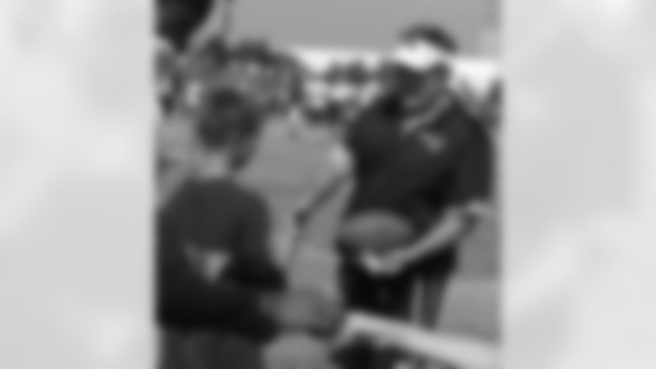 Bill Belichick signs autographs