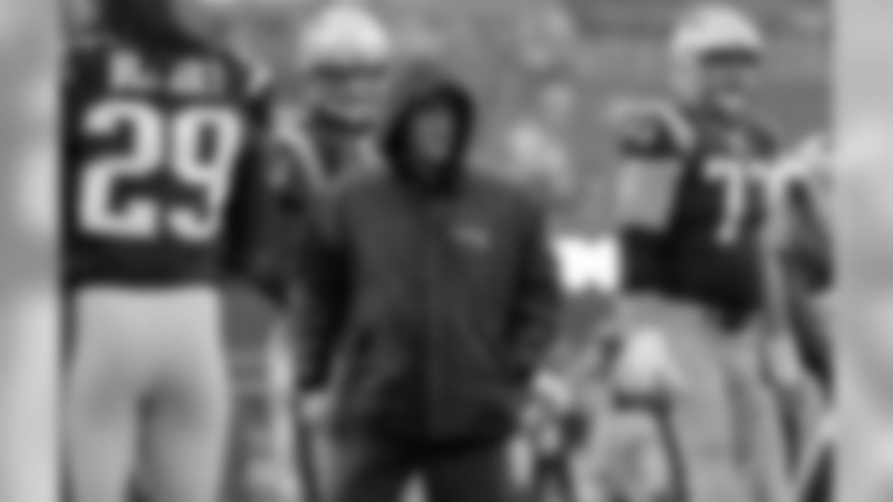 New England Patriots offensive coordinator Josh McDaniels watches as his team warms up before an NFL football game against the New York Jets, Saturday, Dec. 24, 2016, in Foxborough, Mass. (AP Photo/Elise Amendola)
