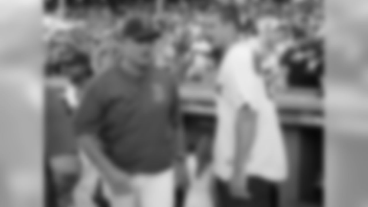 New England Patriots tight end Rob Gronkowski talks with Boston Red Sox manager John Farrell, left, prior to a baseball game at Fenway Park, Tuesday, July 19, 2016, in Boston. (AP Photo/Charles Krupa)