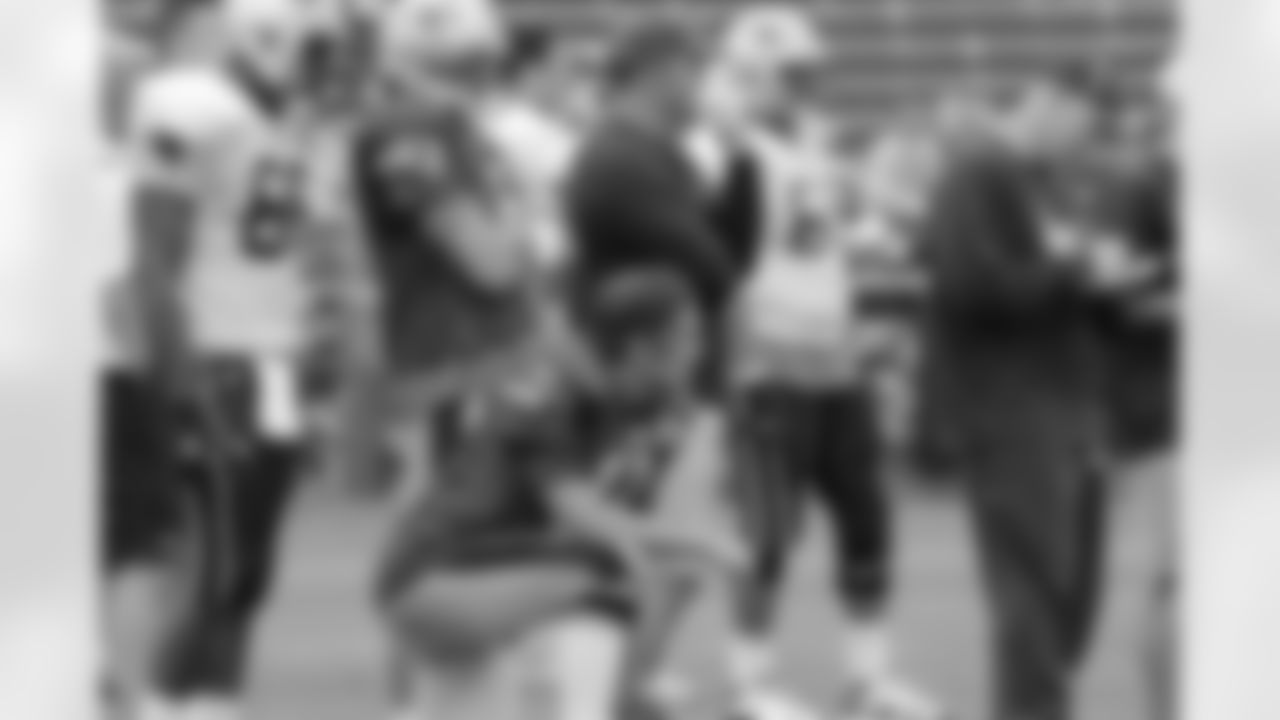 Tom Brady looks on during training camp