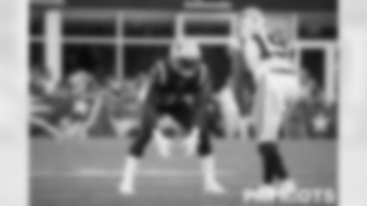 Patriots player preparing to cover Panthers wide receiver Keith Kirkood (19)