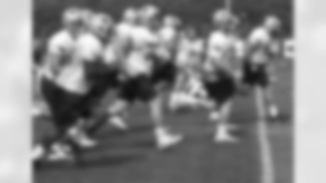 After practice on Day 8 of Training Camp, the team runs sprints across the field. 8/4/2006 Photo by Elizabeth Propper