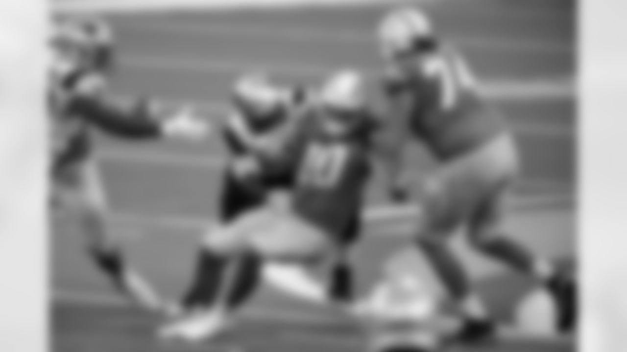 Los Angeles Chargers quarterback Justin Herbert (10) is sacked by New England Patriots defensive tackle Adam Butler during the second half of an NFL football game Sunday, Dec. 6, 2020, in Inglewood, Calif. (AP Photo/Kelvin Kuo)