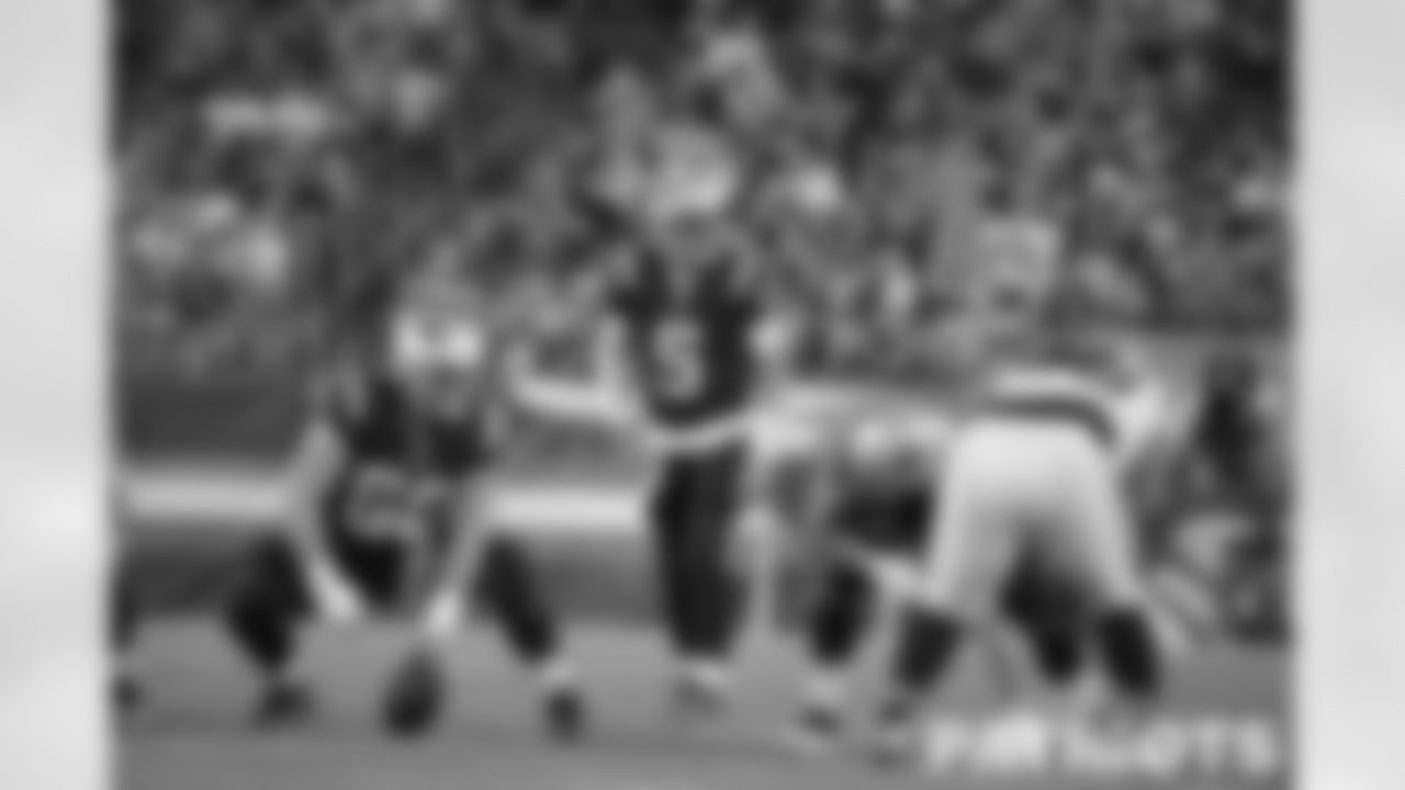 Brian Hoyer (5) and Kody Russey (66) pre snap