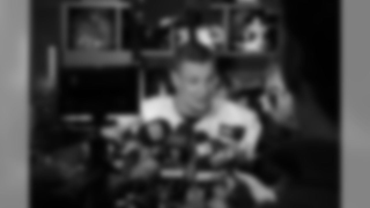 Rob Gronkowski surrounded by the media
