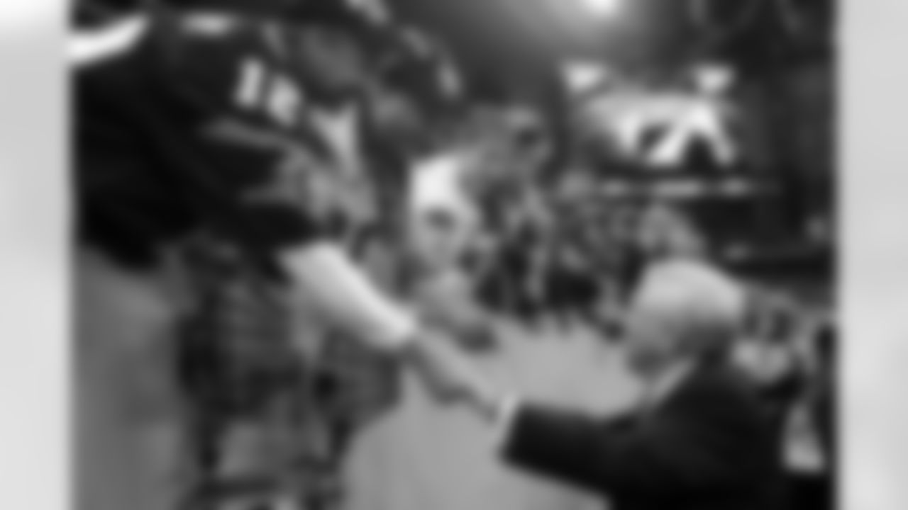 Robert Kraft greets the fans