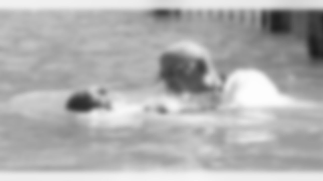 Aeneas Williams is baptized in the Jordan River.
