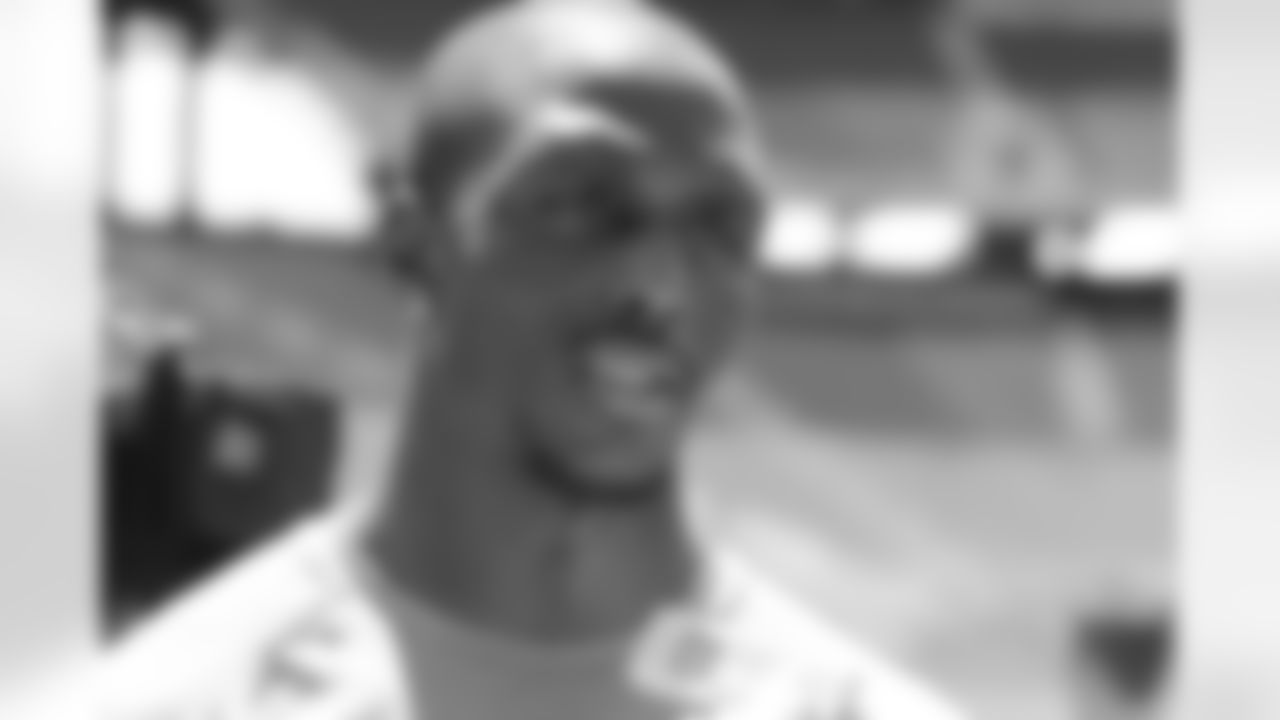 Devin McCourty talks with the media