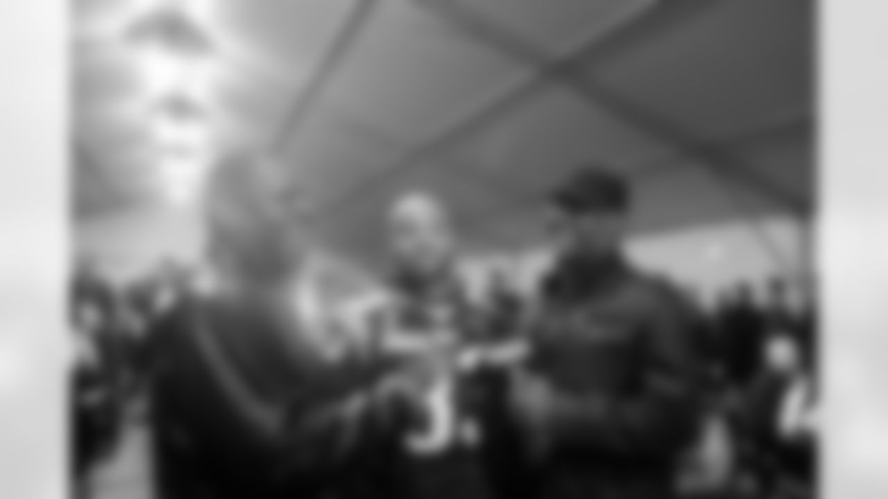 Troy Brown and Ty Law grab Kevin Faulk for an interview