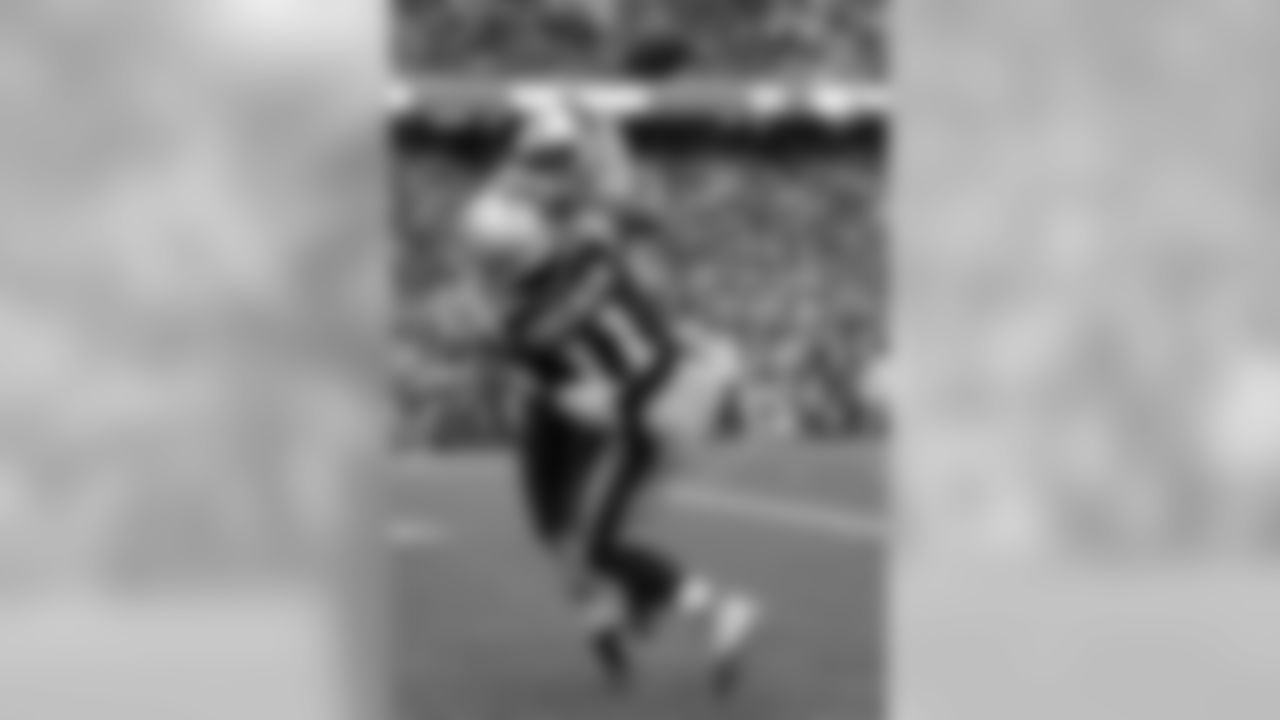 New York Jets cornerback Juston Burris, rear, breaks up a pass intended for New England Patriots wide receiver Julian Edelman (11) during the first half of an NFL football game, Saturday, Dec. 24, 2016, in Foxborough, Mass. (AP Photo/Charles Krupa)