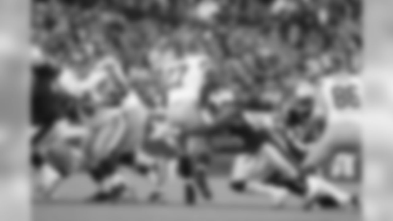 Patriots LB Brandon Spikes brings down Giants RB Brandon Jacobs