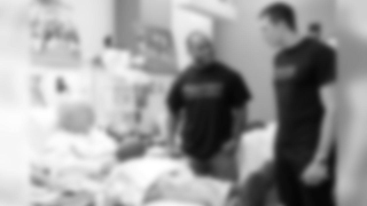 Zotan Mesko & Malcolm Williams chat with a donor at the Kraft Family Blood Donor Center at Dana-Farber