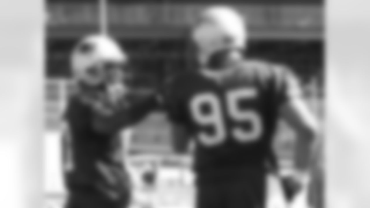 Ellis Hobbs(27) and Tully Banta-Cain(95) engage in sideline discussion during drills in the morning practice on Day 11 of Training Camp. Photo by Elizabeth Propper