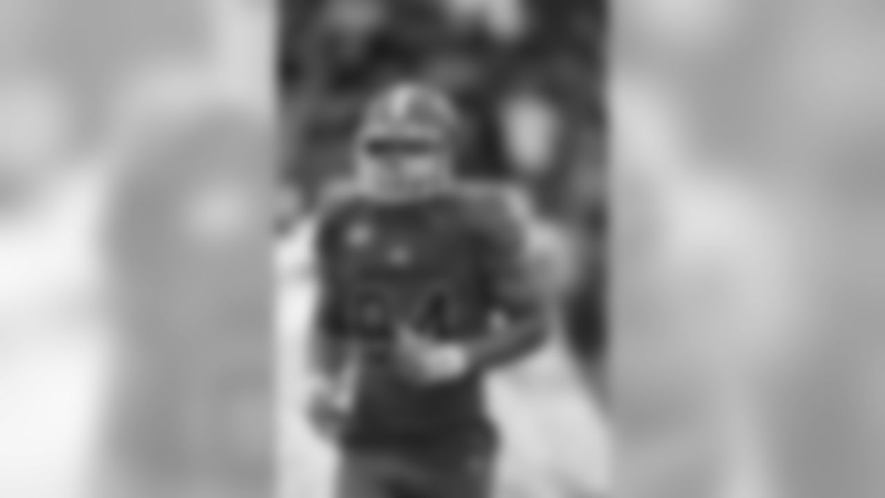 North squad outside linebacker Derek Rivers of Youngstown State (94) runs on the field during the player introductions of the Senior Bowl NCAA college football game, Saturday, Jan. 28, 2017, at Ladd-Peebles Stadium in Mobile, Ala. (AP Photo/Butch Dill)
