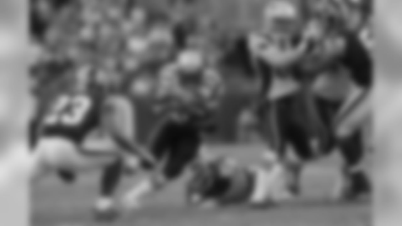 Running back Kevin Faulk gets a carry during the first half on Sunday, December 11, 2011.