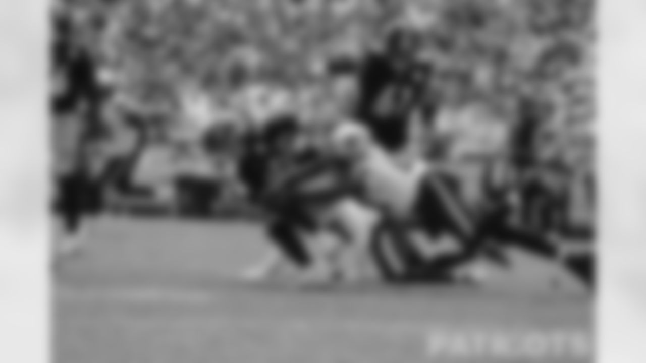 Mitch Triubisky is sacked by the Patriots defense