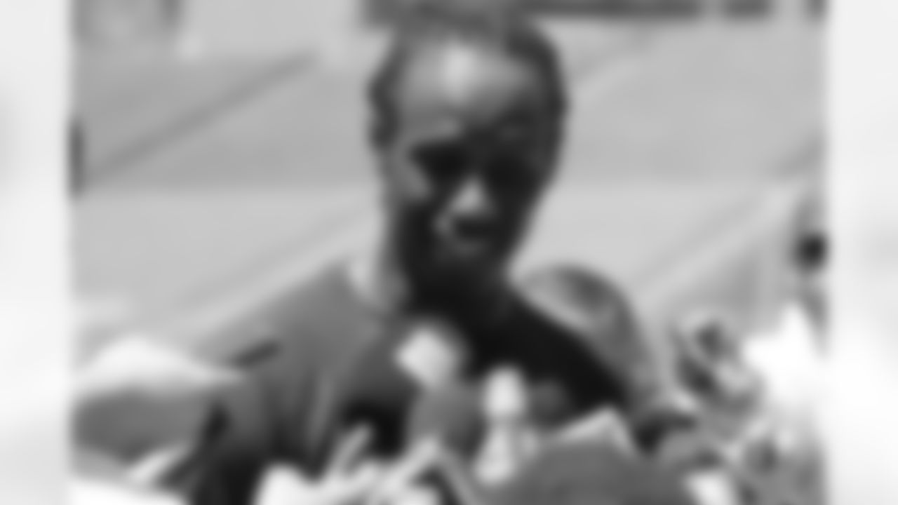Brandon Lloyd talks with the media