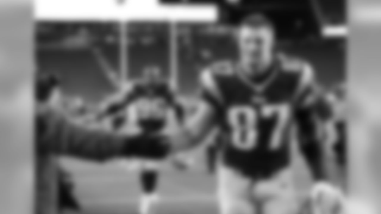 Rob Gronkowski high-fives a fan