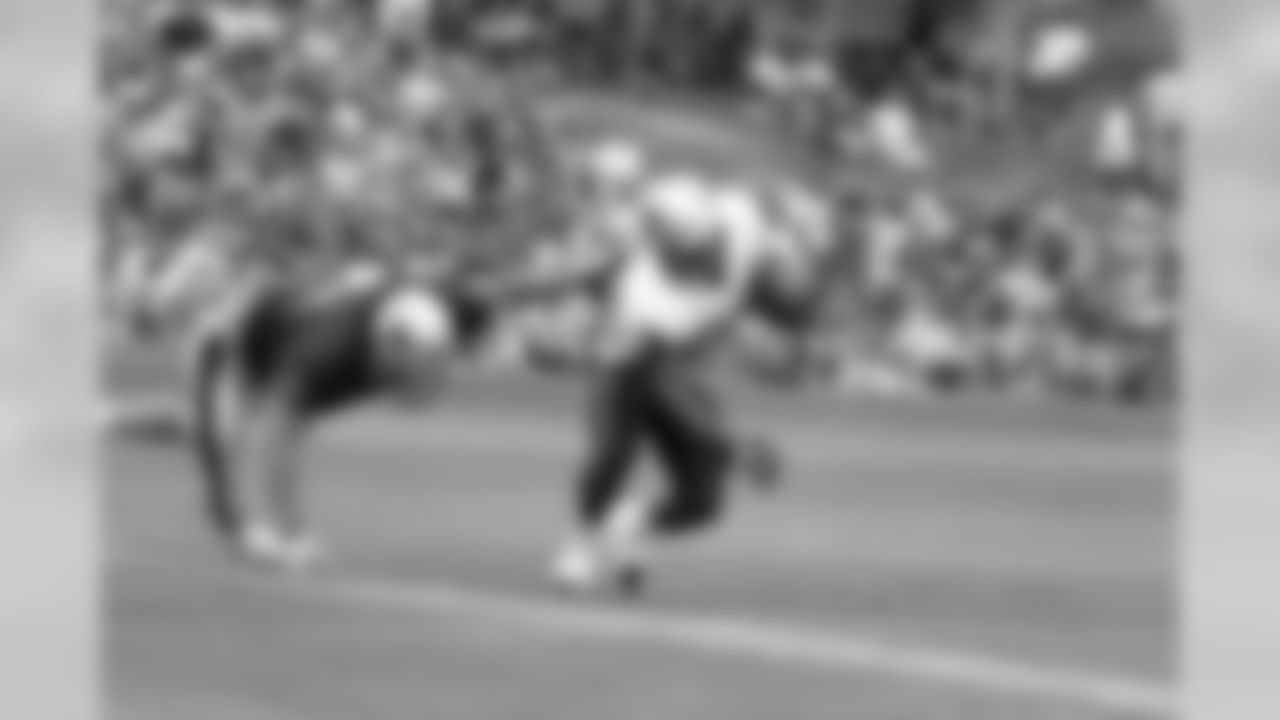 Rookie Stevan Ridley sheds a tackle during training camp drills