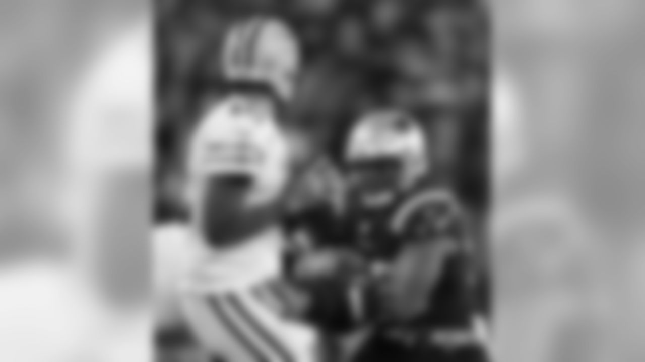 Aaron Rodgers and Trey Flowers