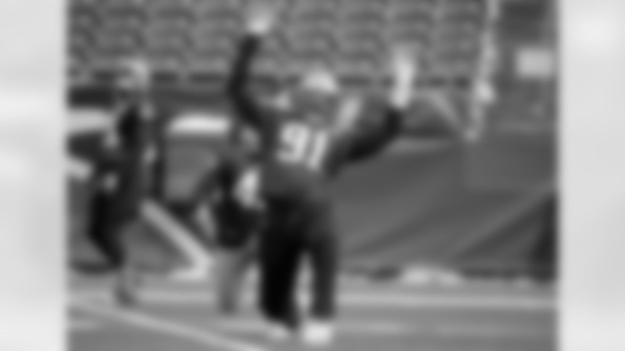 New England Patriots defensive tackle Deatrich Wise (91) stretches during an NFL football practice, Tuesday, Jan. 9, 2018, at Gillette Stadium, in Foxborough, Mass. The Patriots are scheduled to host the Tennessee Titans in an NFL divisional football AFC playoff game, Saturday, Jan. 13, 2018, in Foxborough. (AP Photo/Steven Senne)