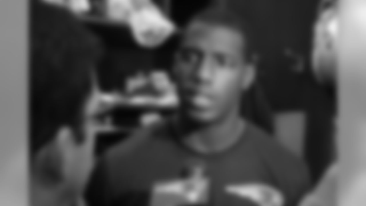 Duron Harmon talks with the media