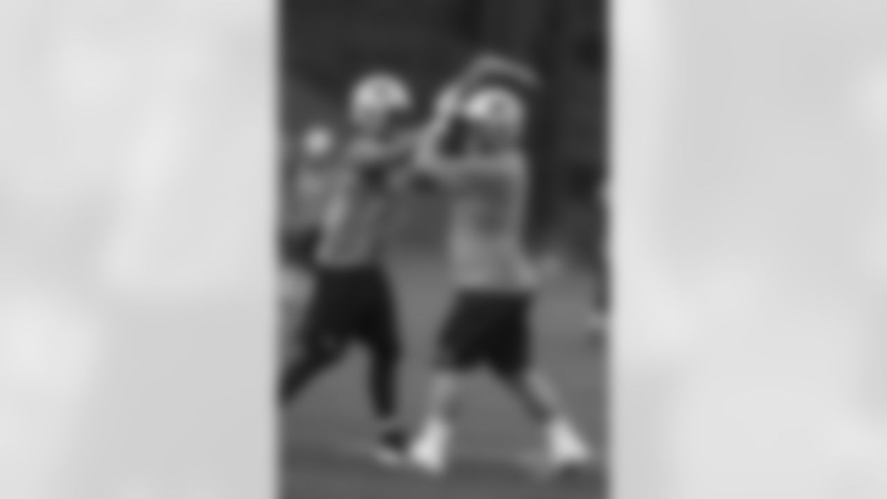 OL Josh Kline and FB James Develin working with pads