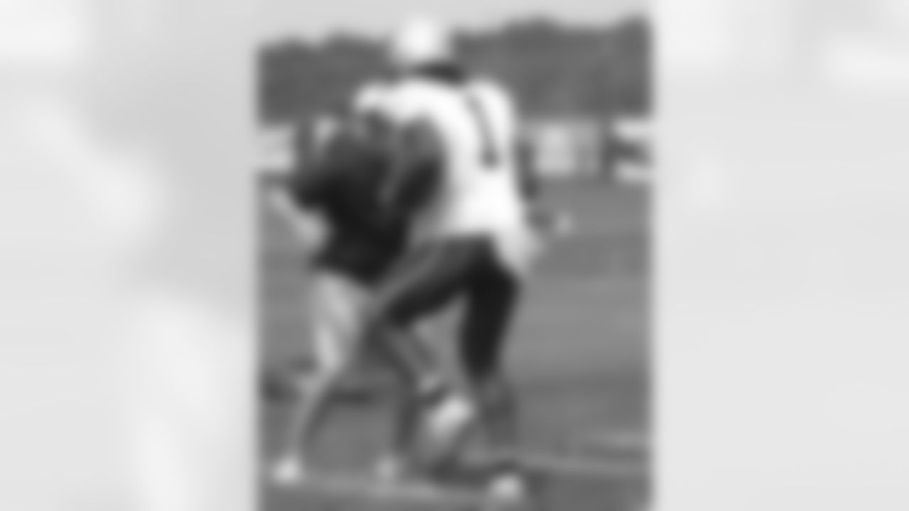 WR Keron Henry(1) conditions his body before practice on Day 9 of Training Camp. 8/7/2006 Photo by Elizabeth Propper