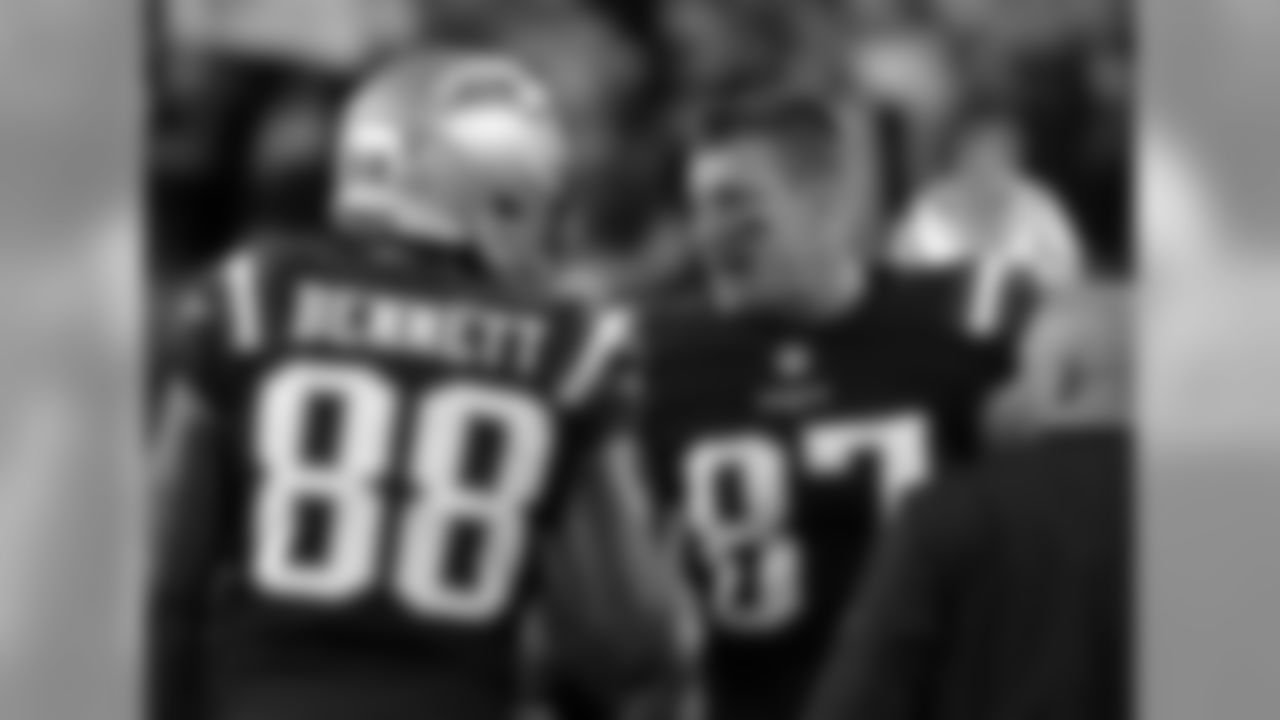 New England Patriots tight ends Martellus Bennett (88) and Rob Gronkowski (87) speak during the second half of an NFL football game against the Houston Texans Thursday, Sept. 22, 2016, in Foxborough, Mass. (AP Photo/Elise Amendola)