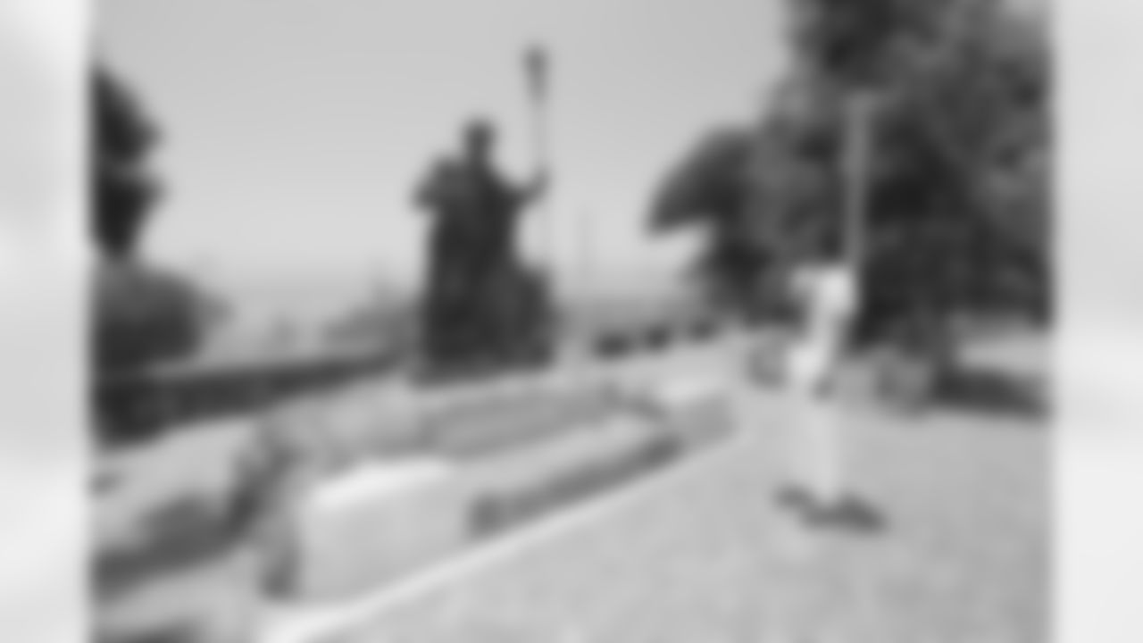 Andre Reed gazes at the Statue of St. Peter at Capharnaum.