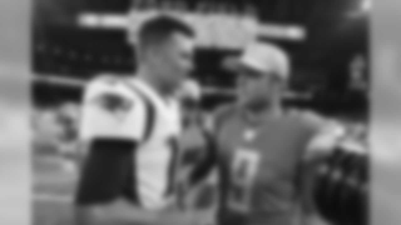 New England Patriots quarterback Tom Brady, left, greets Detroit Lions quarterback Matthew Stafford after a preseason NFL football game Thursday, Aug. 8, 2019, in Detroit. (AP Photo/Paul Sancya)