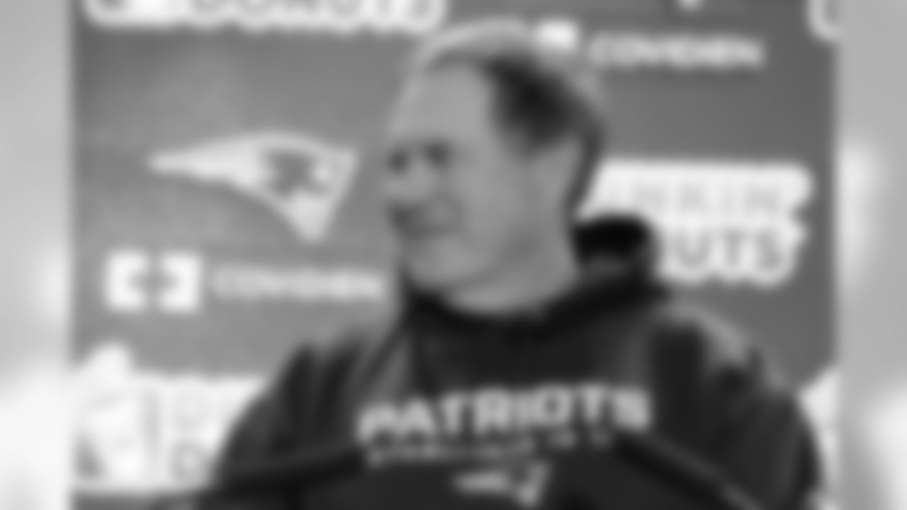 Bill Belichick talks with the media