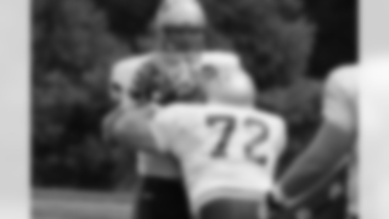 Matt Light runs through a drill during his first training camp practice