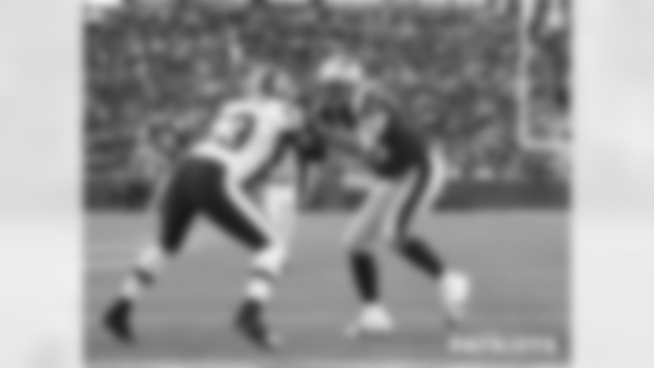 Linebacker turned tight tend Mike Vrabel scores on a 2 yard touchdown pass from Tom Brady in the second quarter.