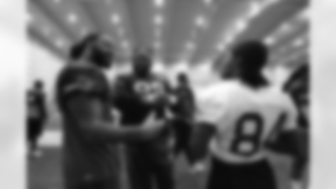 Brandon Spikes, Gerard Warren, and Deion Branch at practice