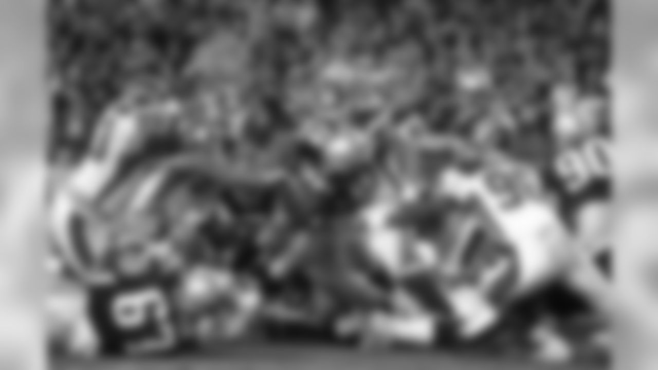 The Patriots trailed by nine points with 10 minutes to go but rallied behind two fourth-quarter TD runs by Corey Dillon, including the go-ahead score with 5:32 left, in New England's 21-16 victory on Oct. 30, 2005.